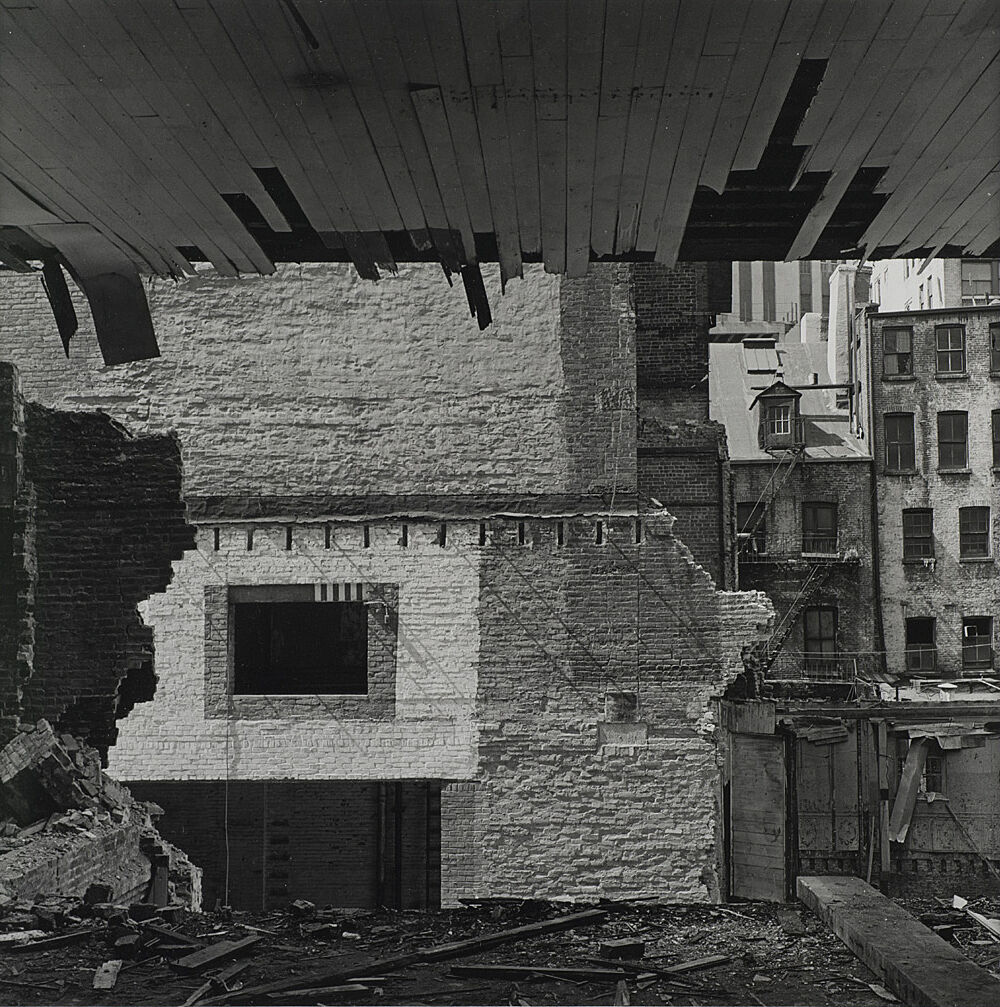A photograph of a crumbling wall.