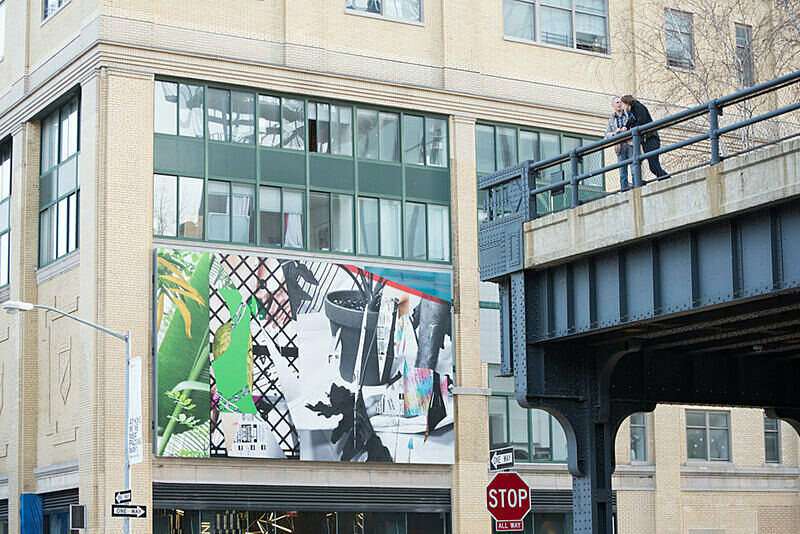Visitors on the Highline look at a billboard artwork by Michele Abeles