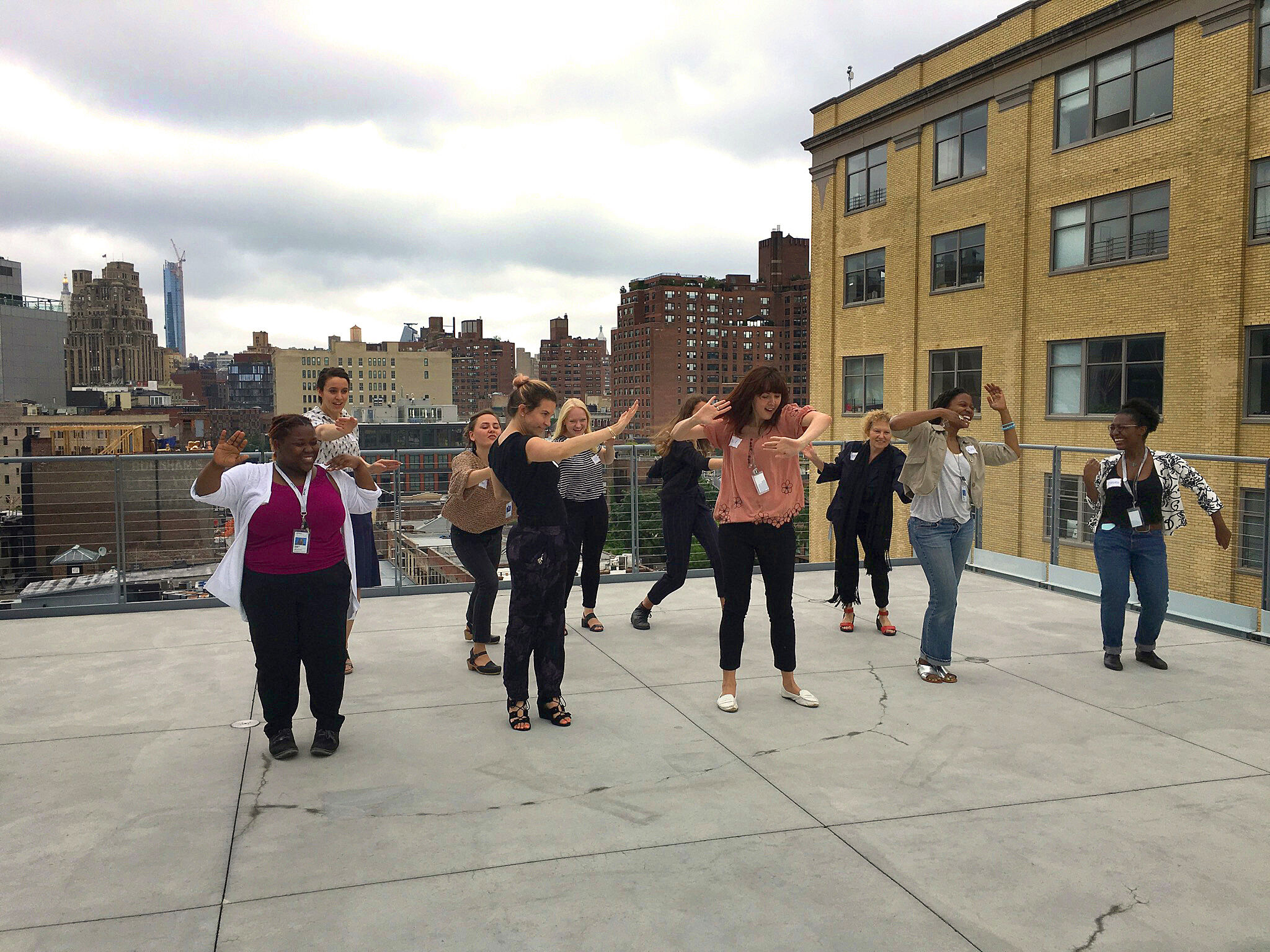 The Whitney staff shows off dance moves during the workshop