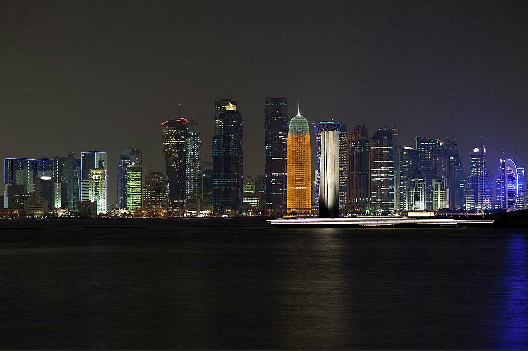 Doha skyline at night from across the water.