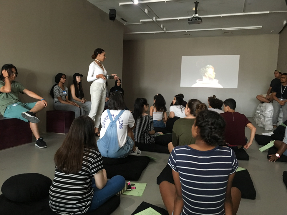 teens sitting preparing to meditate