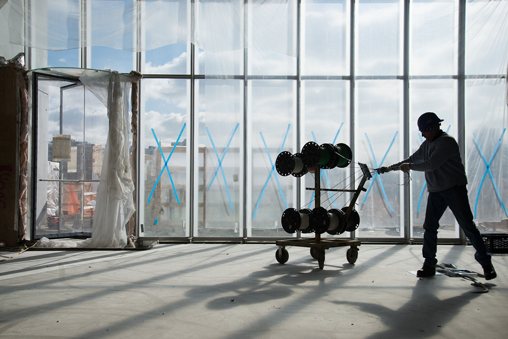 Worker wheeling materials with large window.