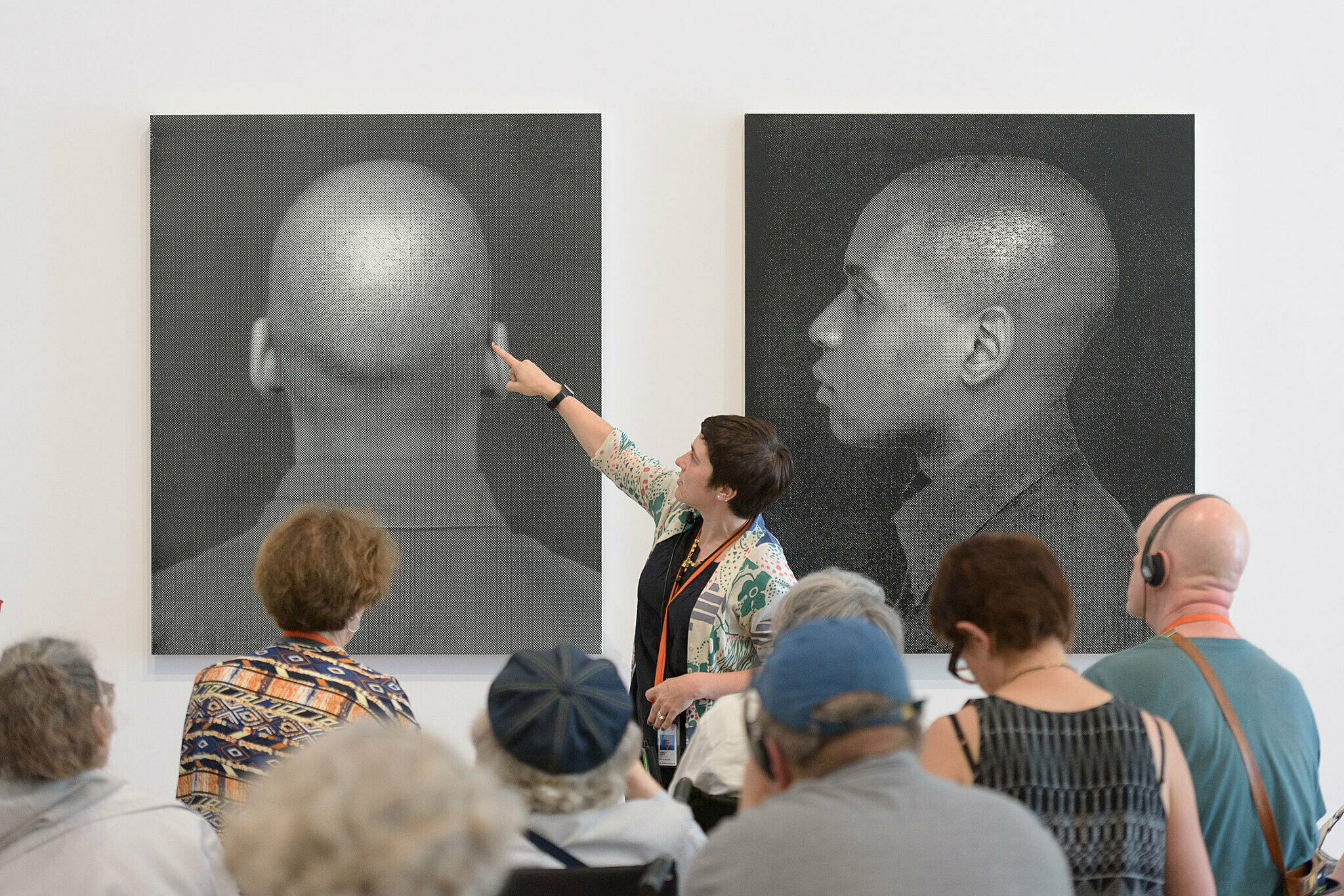 An educator leads a tour in the galleries