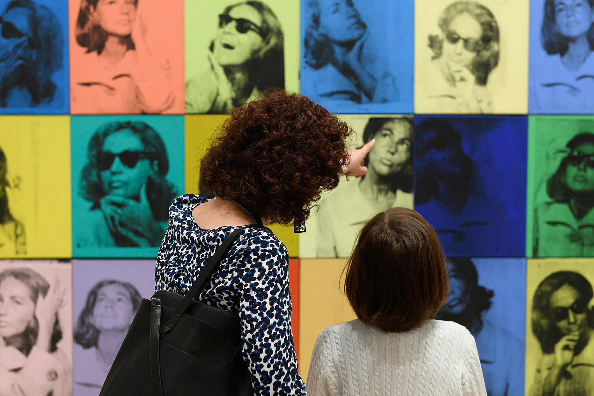 Families explore artwork in the galleries