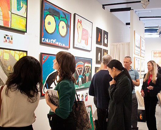 People observe art at the 2015 Outsider Art Fair