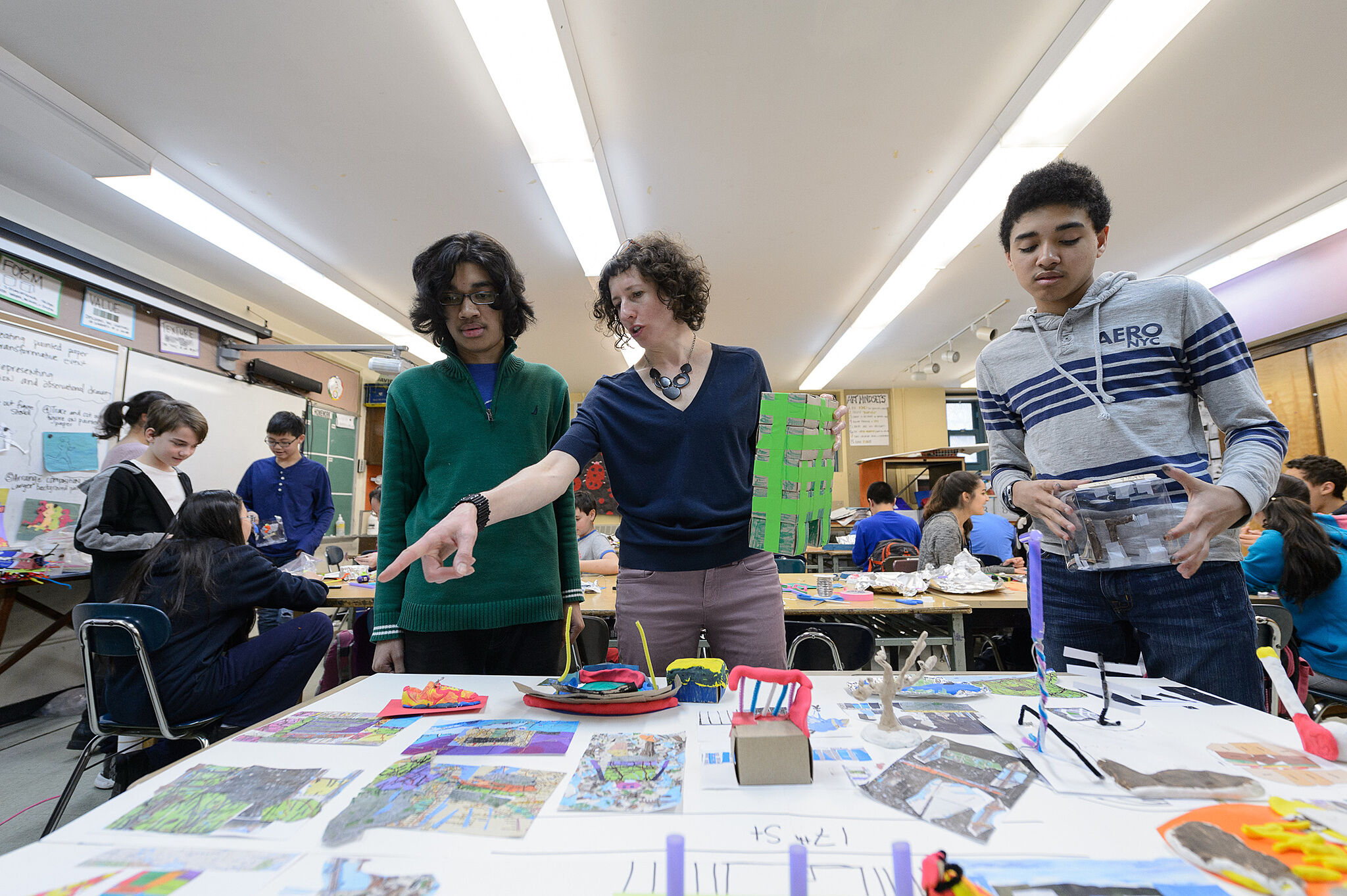 Artist and students in the classroom.