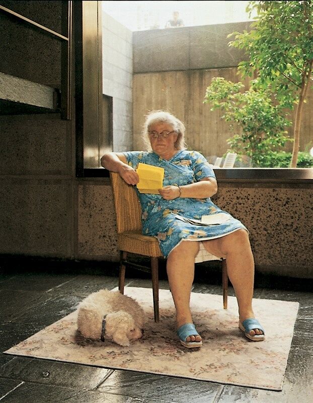 Photo of an elderly woman and dog.