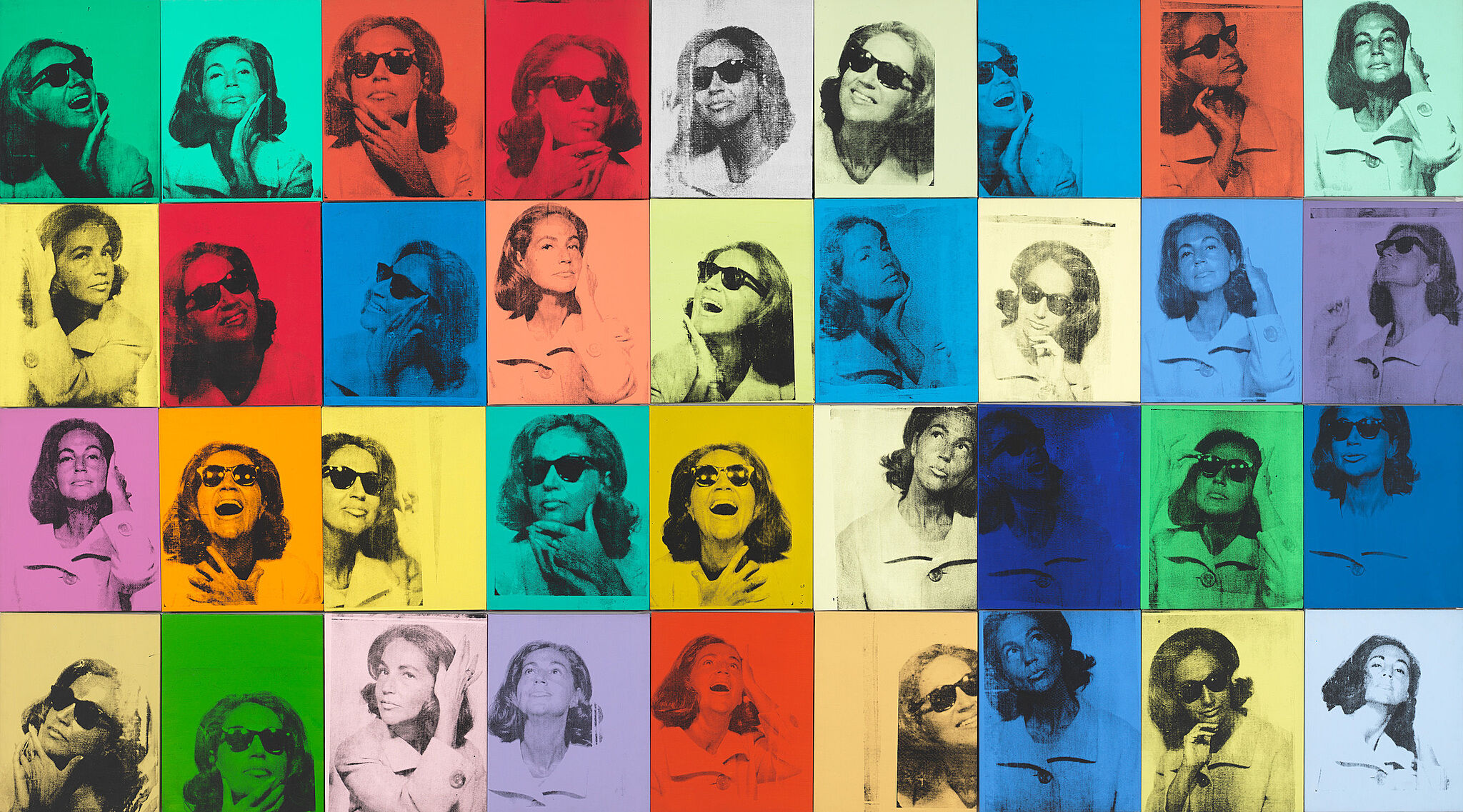 Colorful artwork of woman faces by Andy Warhol.