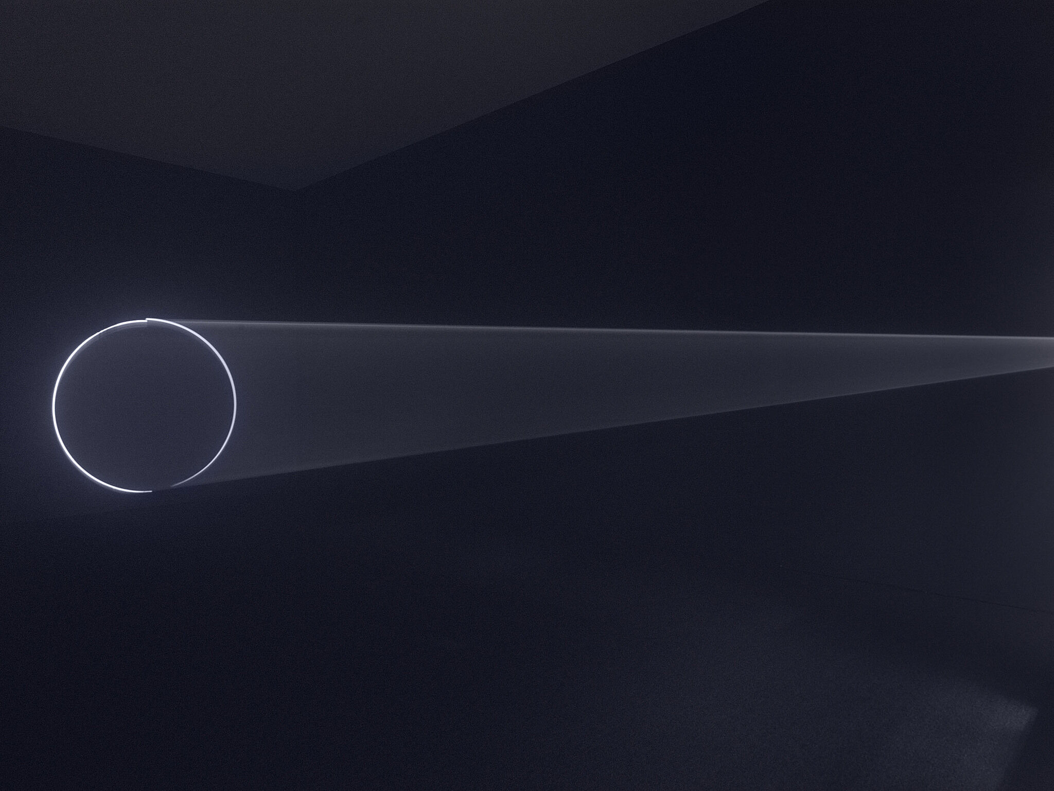 A circular shap at the end of a beam of light.