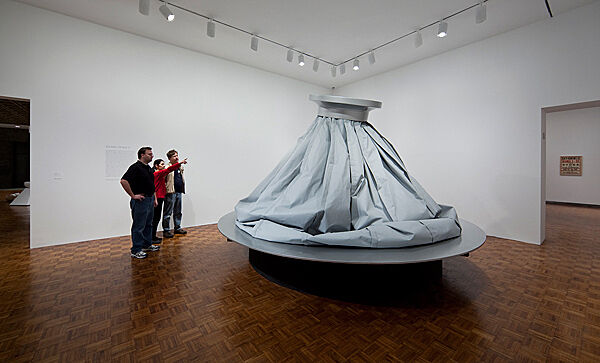 An installation view of a large sculptural ice bag.
