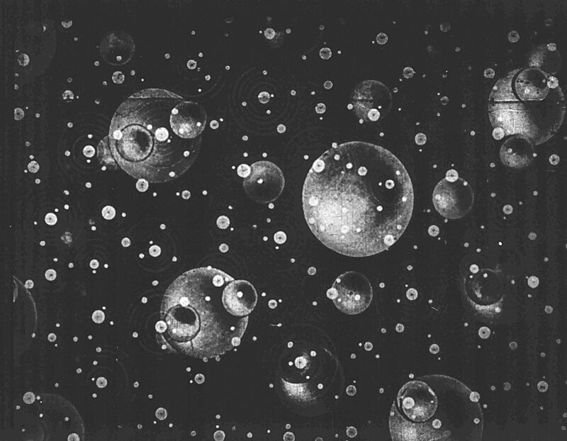 3D balls floating in a black and white background.