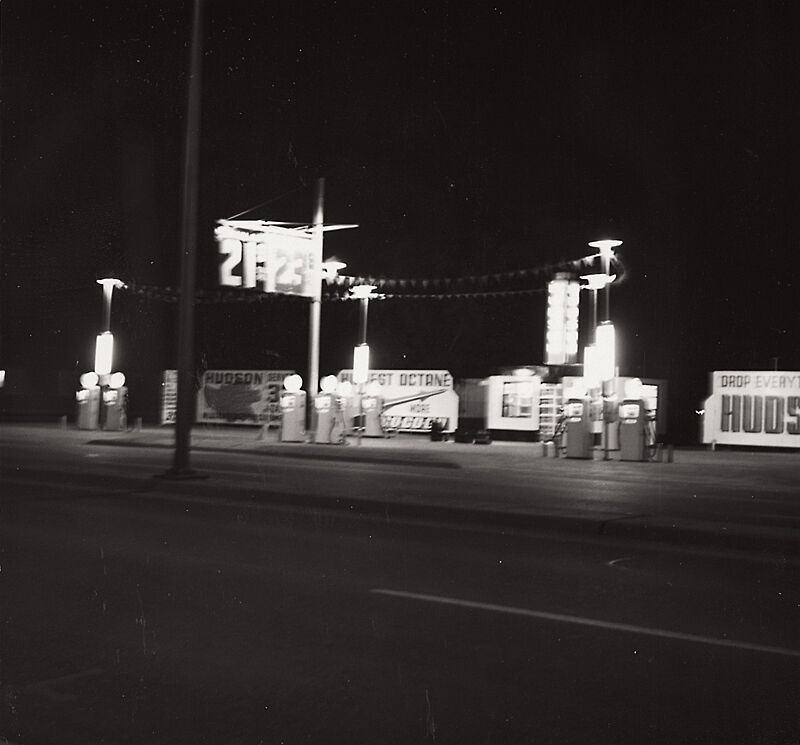 A roadside gas station in black and white.  Photo by Edward Ruscha.