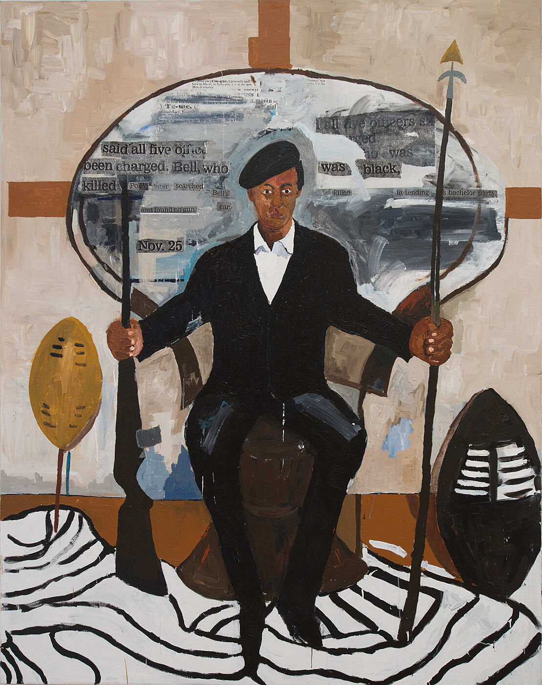 A Black man wearing a black beret, suit jacket, and slacks sits in a peacock chair. The back of his chair is various shades of grey and features glimpses of newspaper clippings throughout. He holds a spear in his left hand and a rifle in the other. The floor is rust colored with an irregularly shaped zebra print rug. The wall behind him is off-white with rust colored intersecting lines.