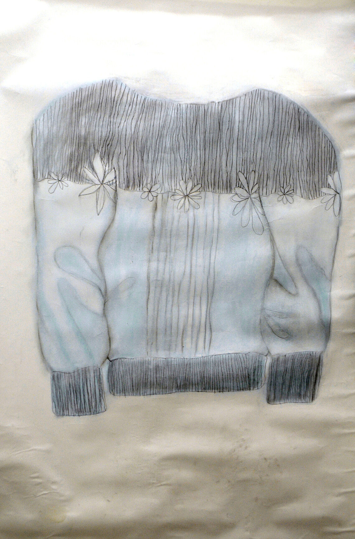 A drawing of a jacket with blue, white, and black shades.