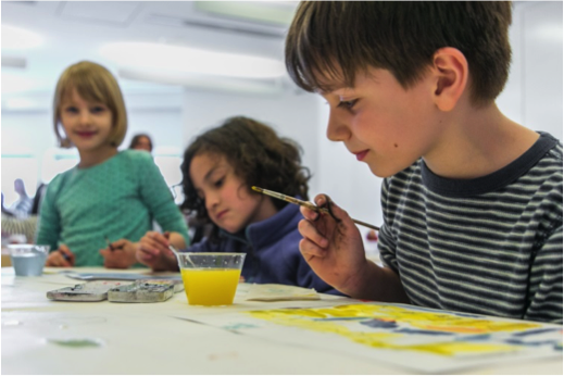 Students paint at the Museum during a Guided Visit + Studio