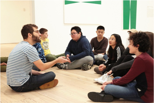 Students discuss the art in the galleries