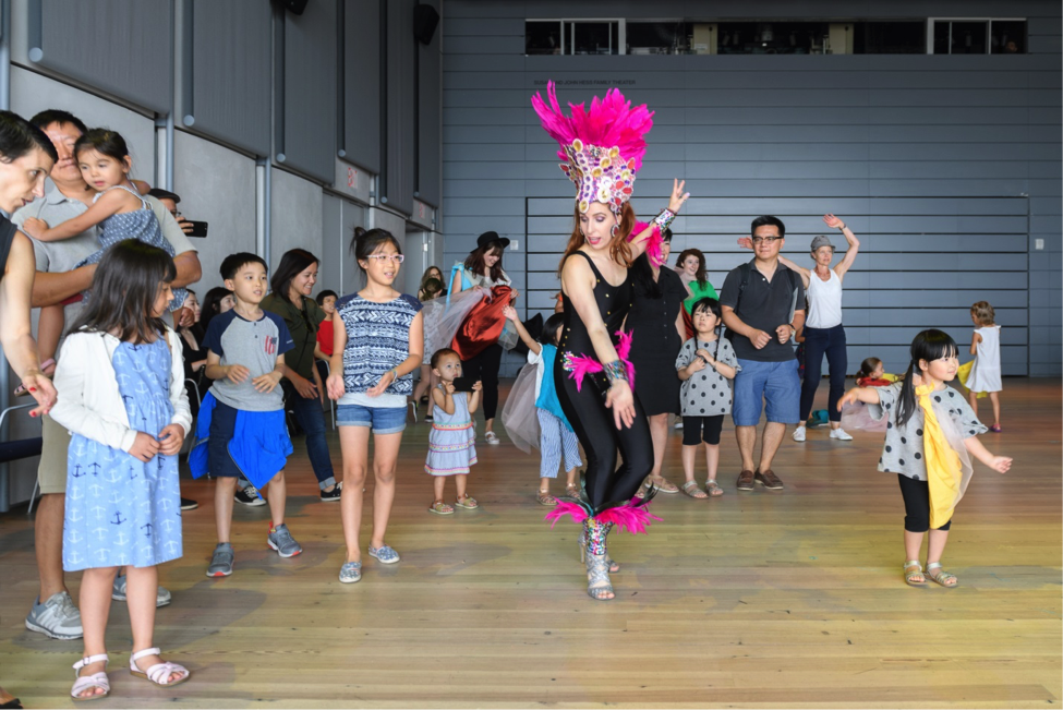 Dancers teach families some Samba moves