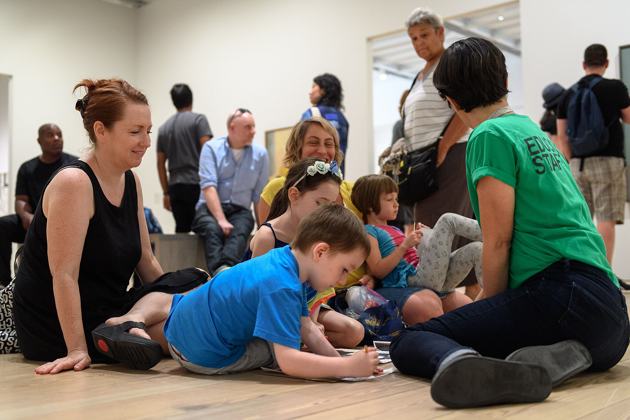 Families exploring art together in the galleries.