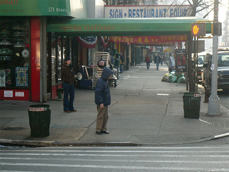 People on a street corner.
