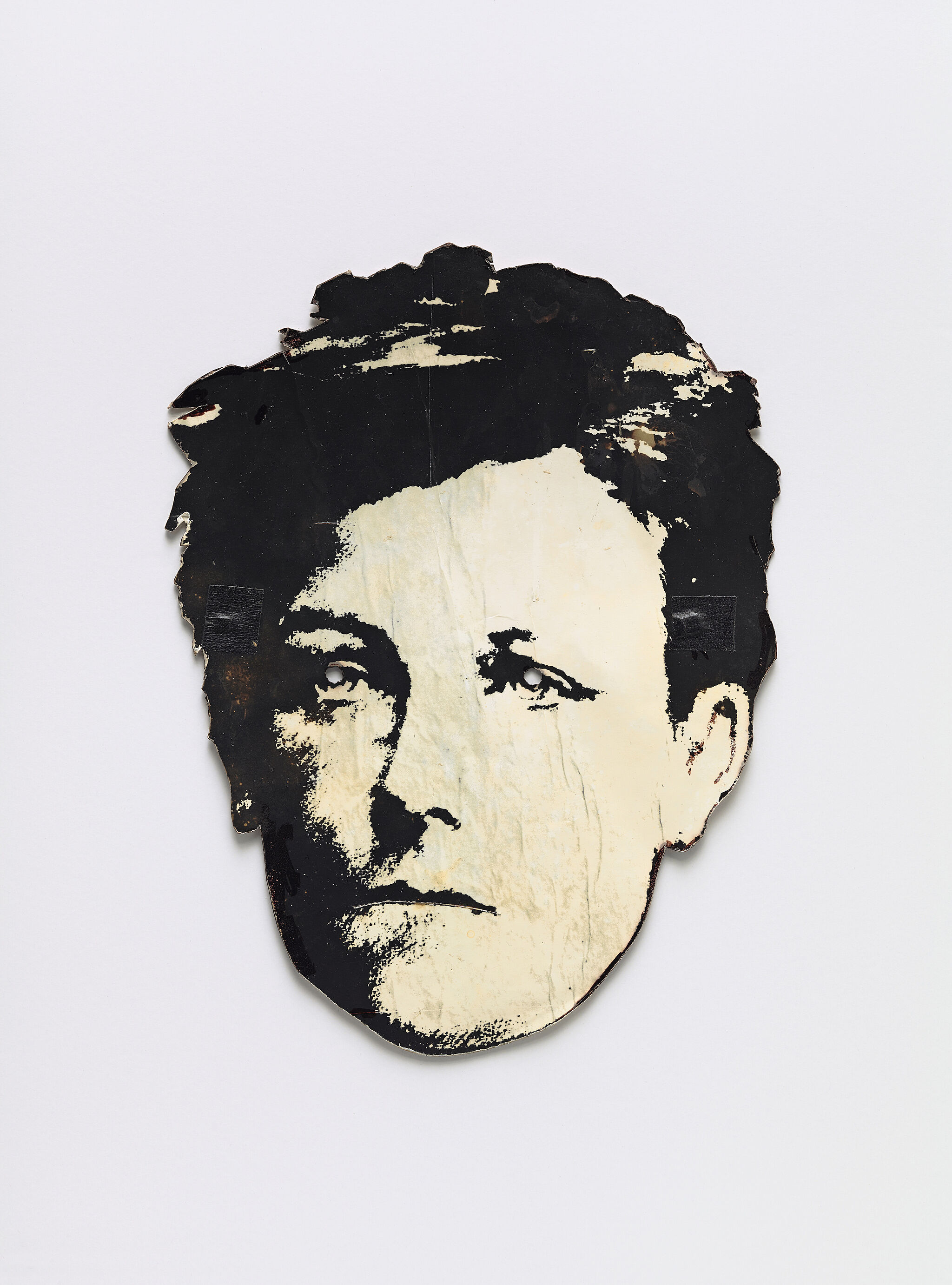 A paper mask of Arthur Rimbaud. 
