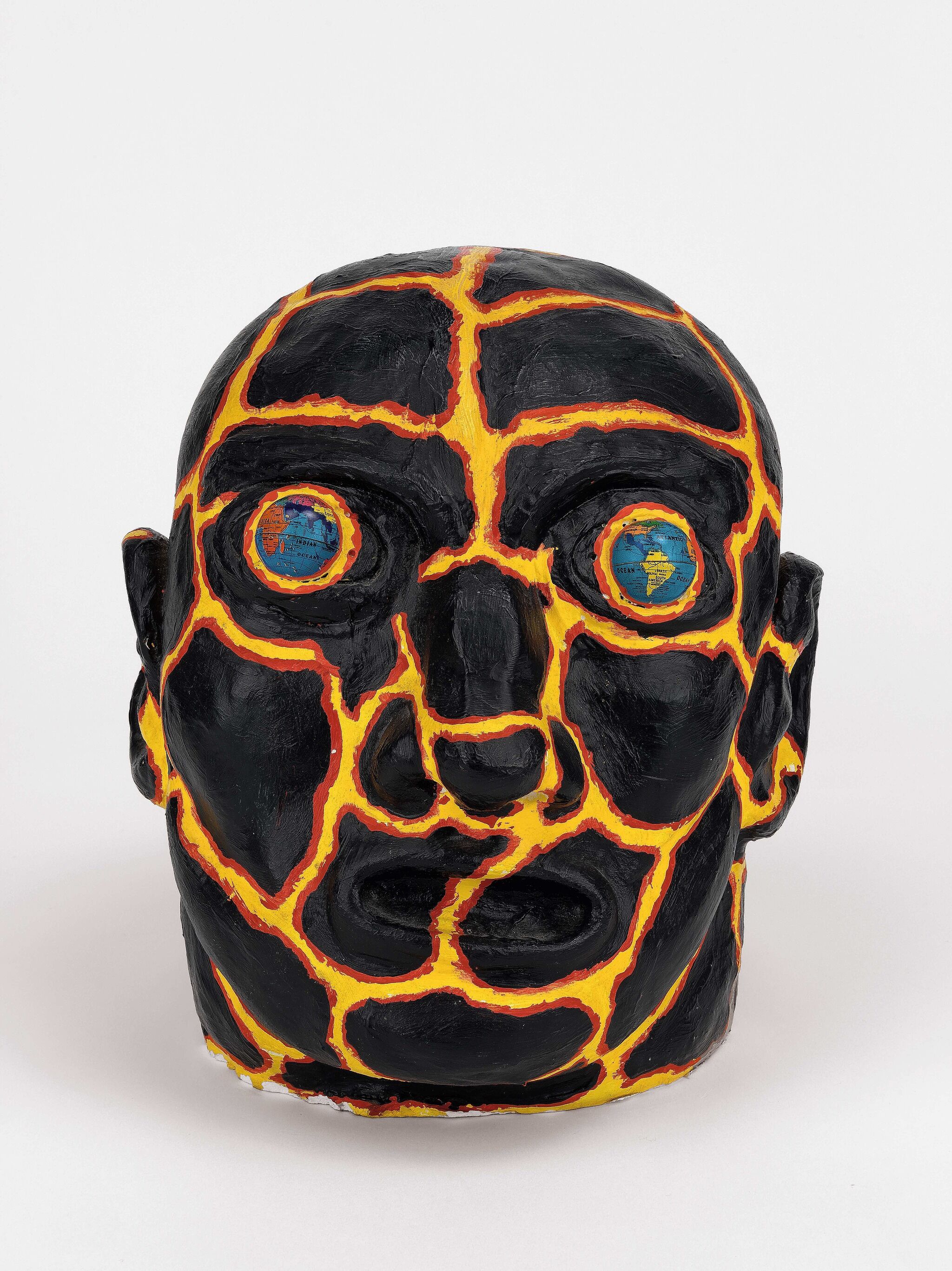 Painted head in black and yellow.