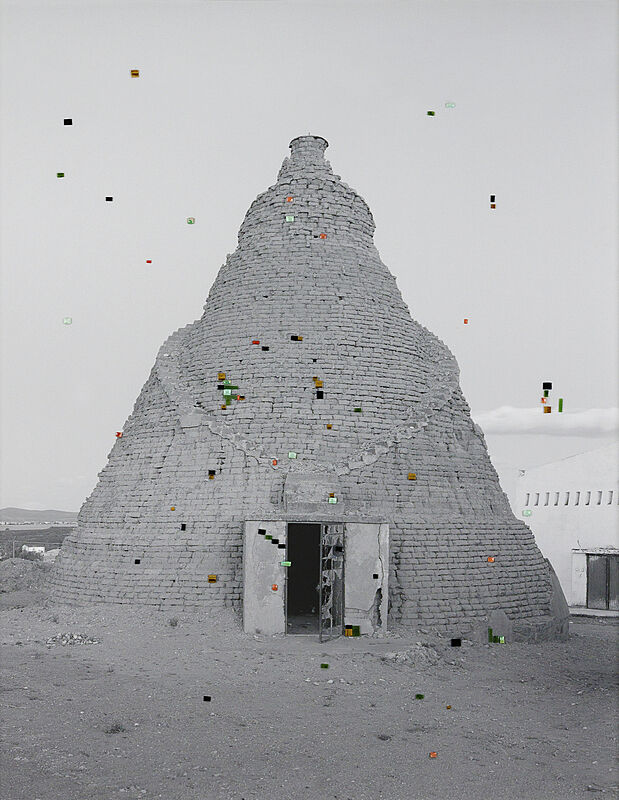 Black and white photograph with stones glued to the surface.