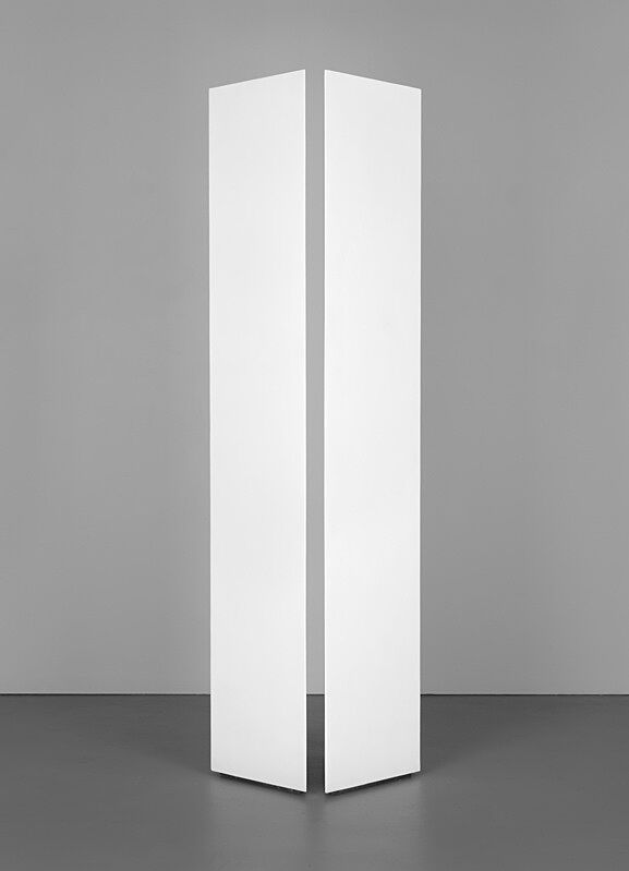 Two symmetrical eight-foot white columns with space in between hovering over a gray background.