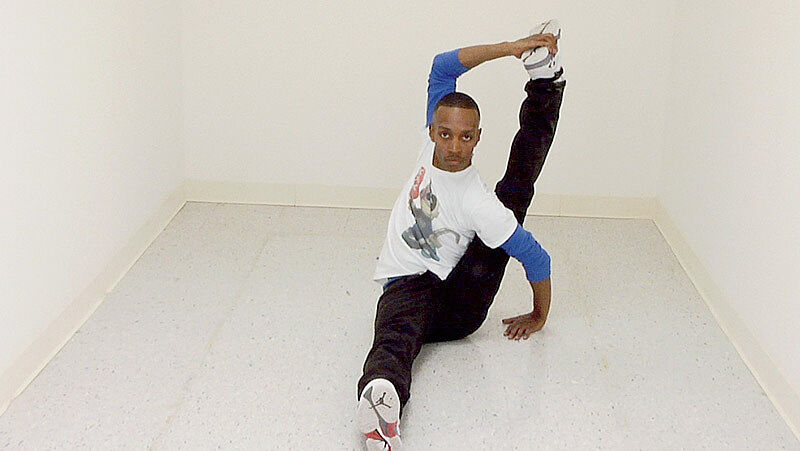A person stretching. 