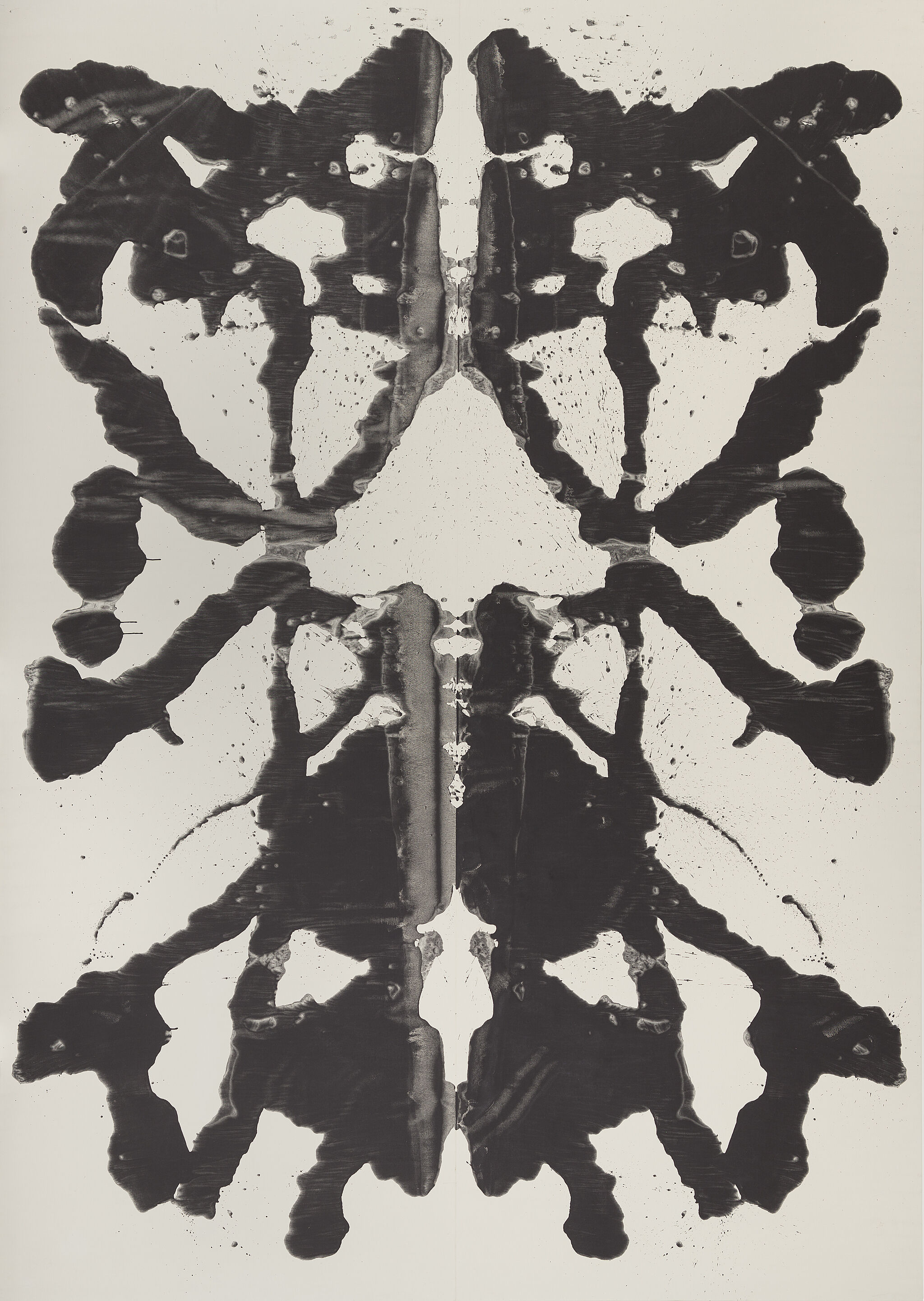 Image of a symmetrical black inkblot.