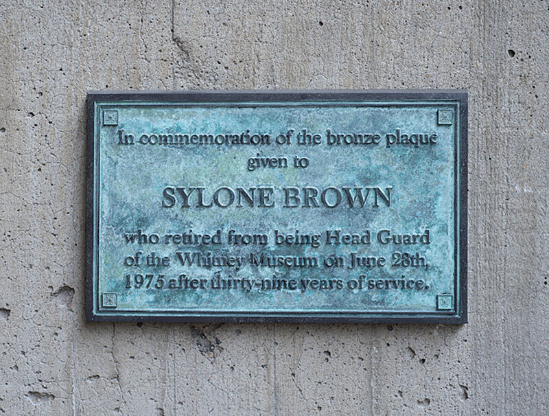 Text on bronze. 