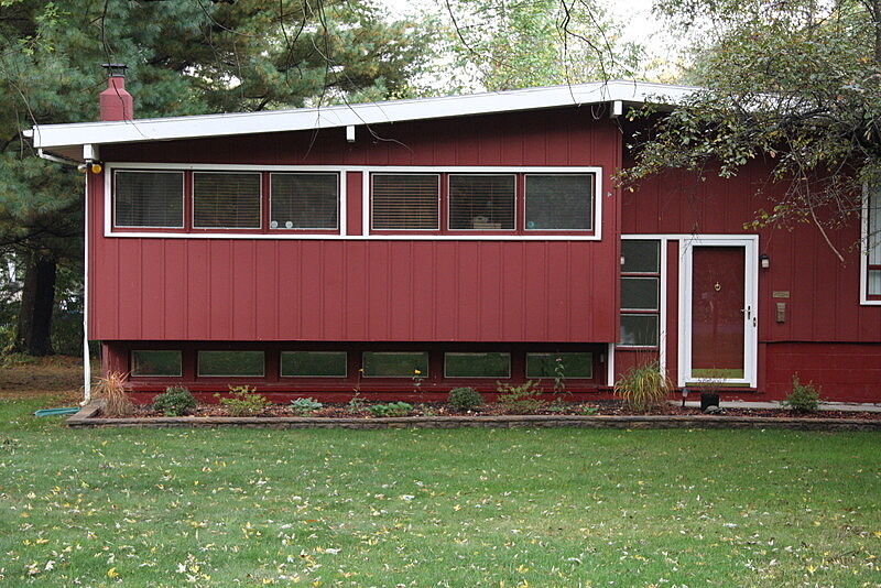 A house in red paint. 