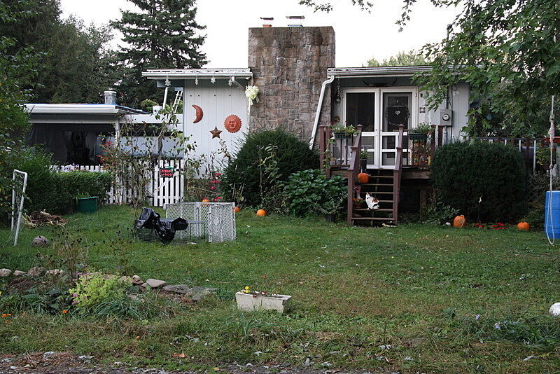 A backyard of a house. 