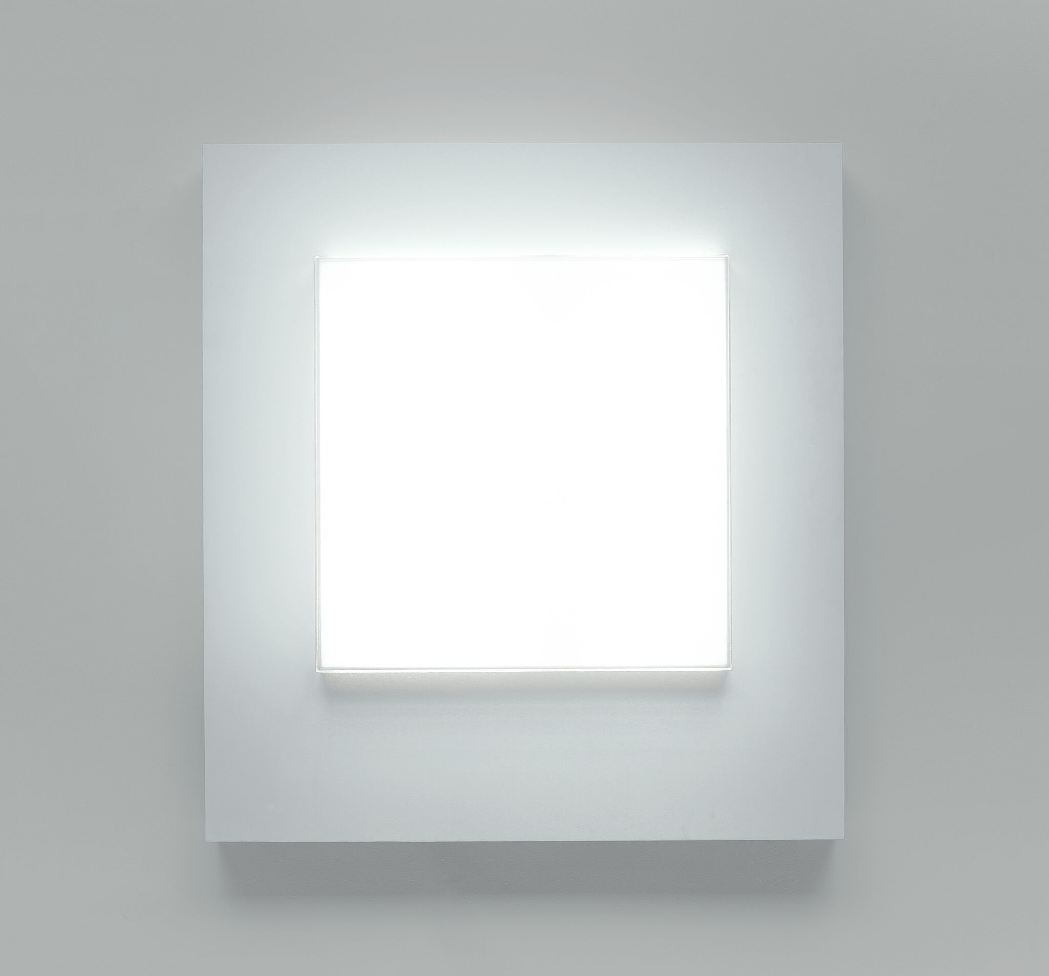 White glowing square in the middle of a larger white square.