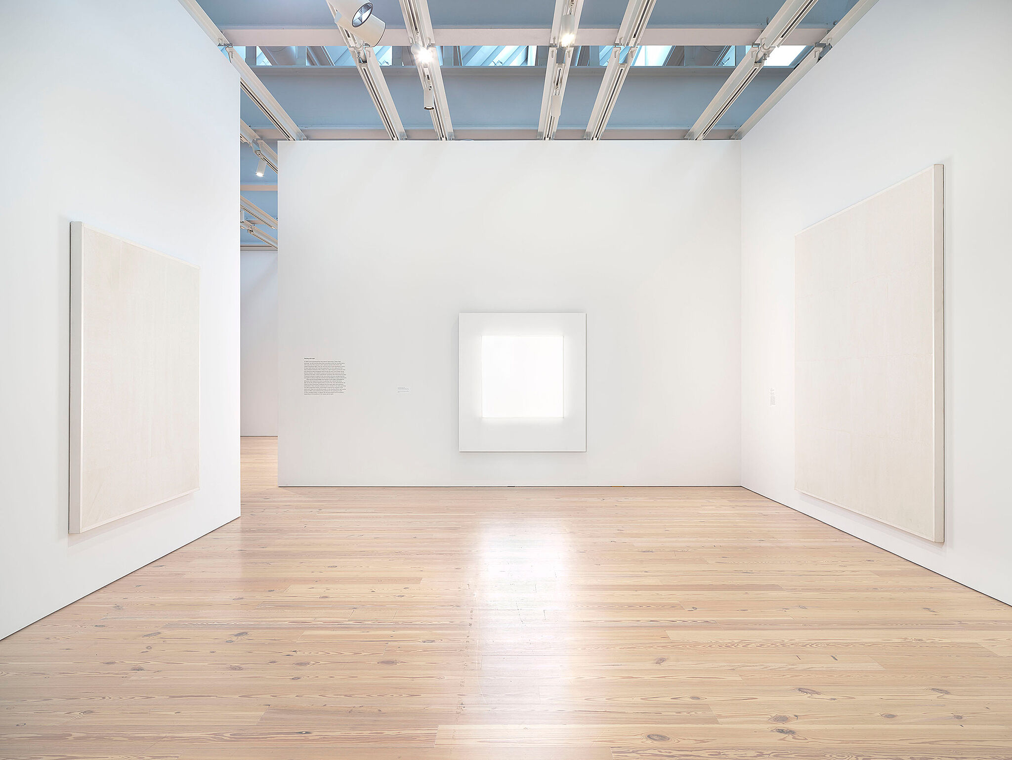 Installation view of Mary Corse works at the Whitney Museum