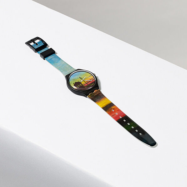 Watch with a painting of a sunset on its face
