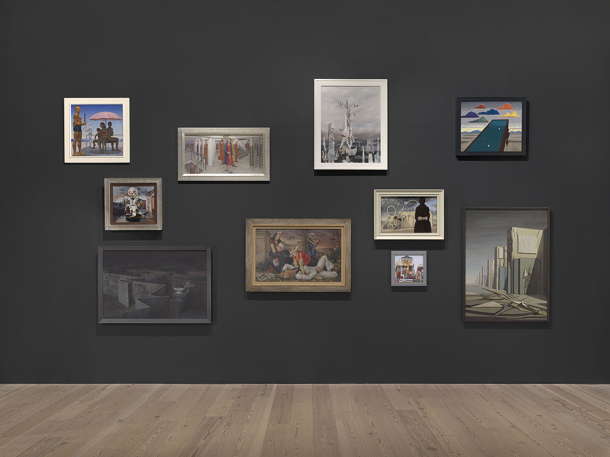 An image of the Whitney galleries with paintings on the wall