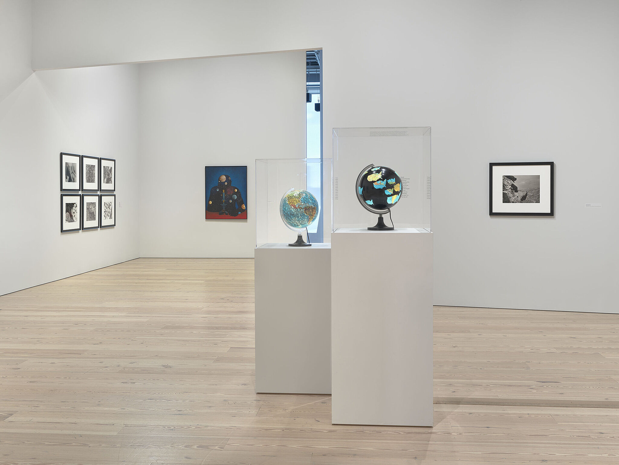 An image of the Whitney galleries with various artworks on the wall
