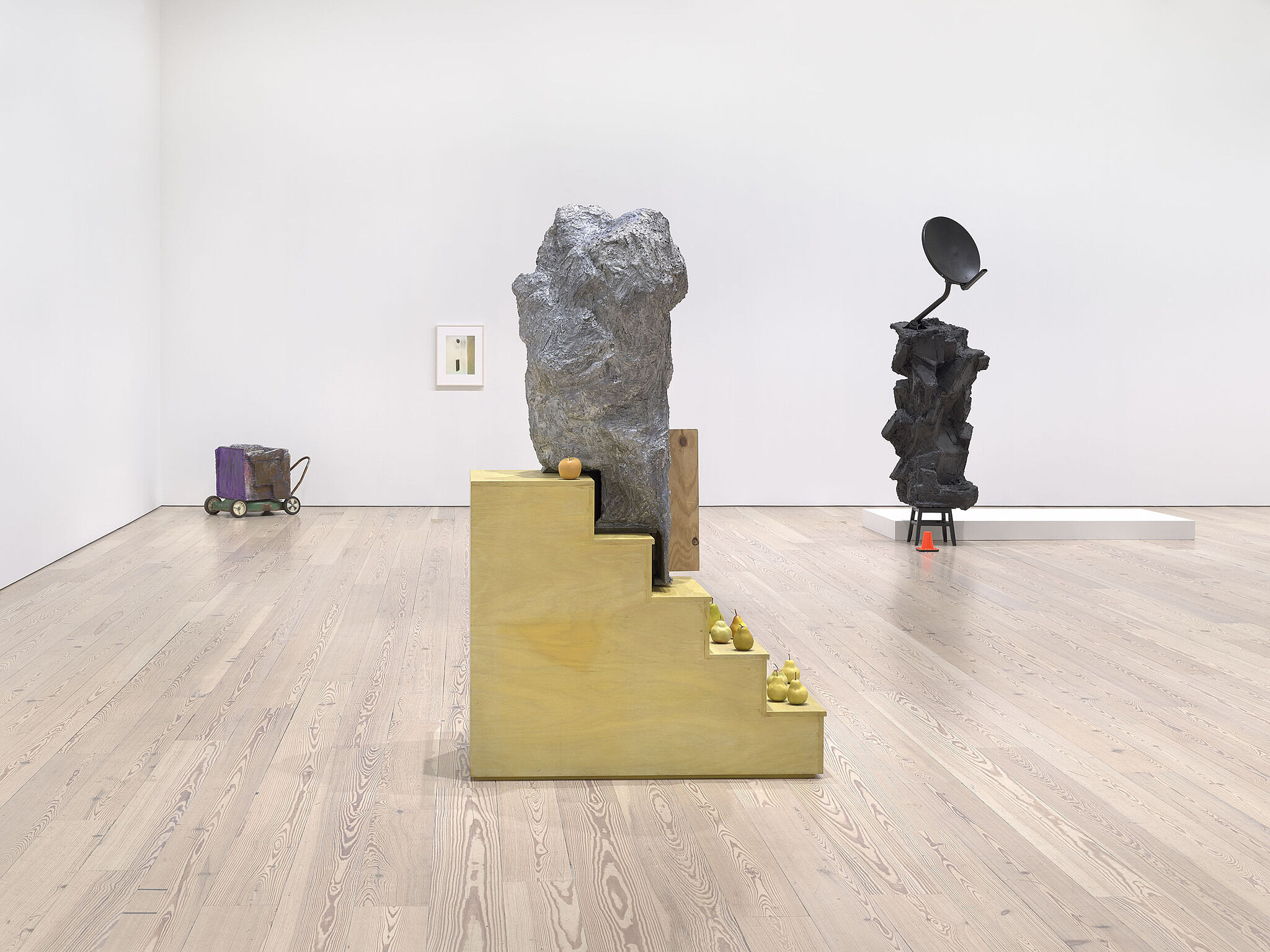 An image of the Whitney galleries with various sculptures.