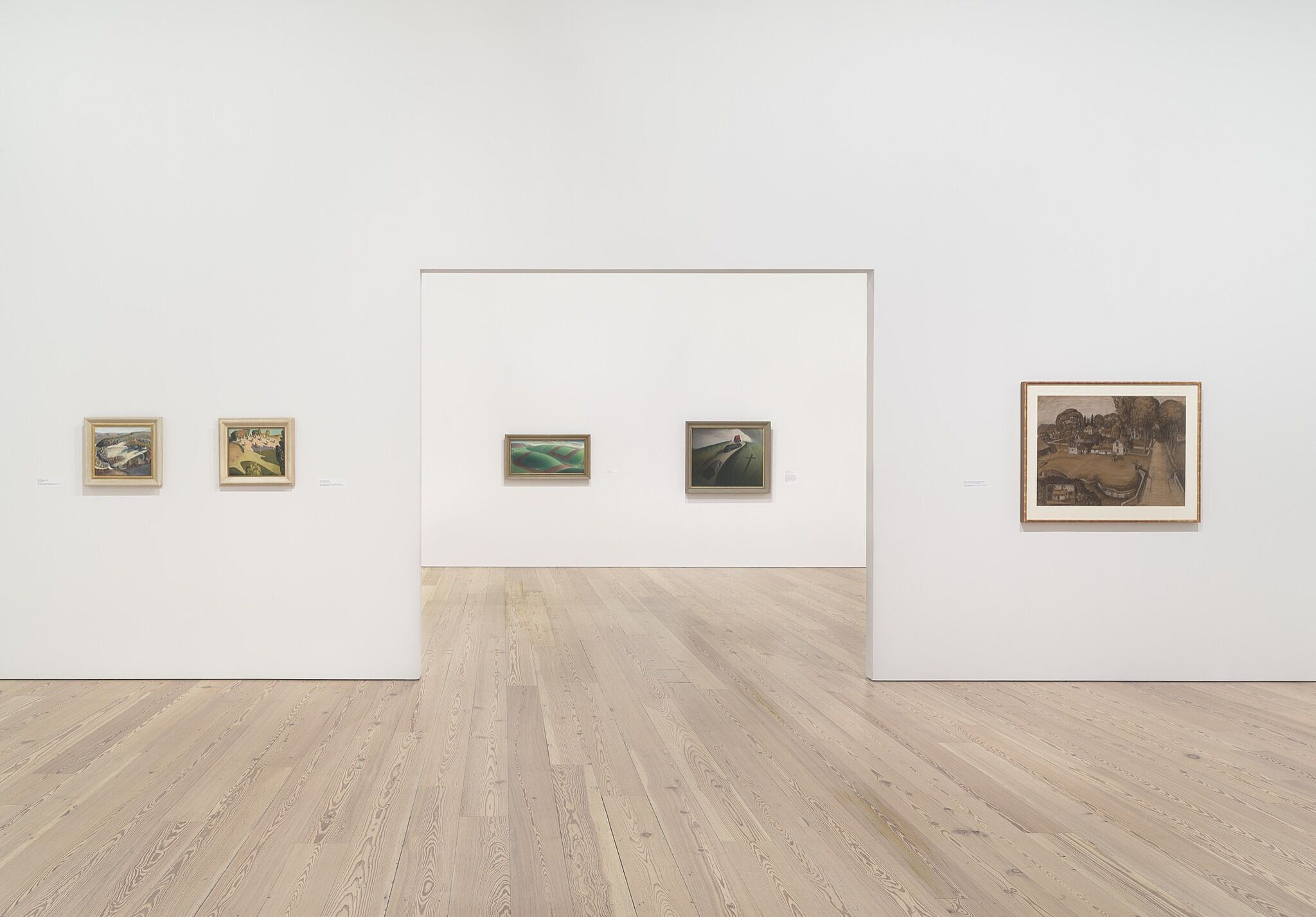 A photo of the Whitney galleries with various artworks.