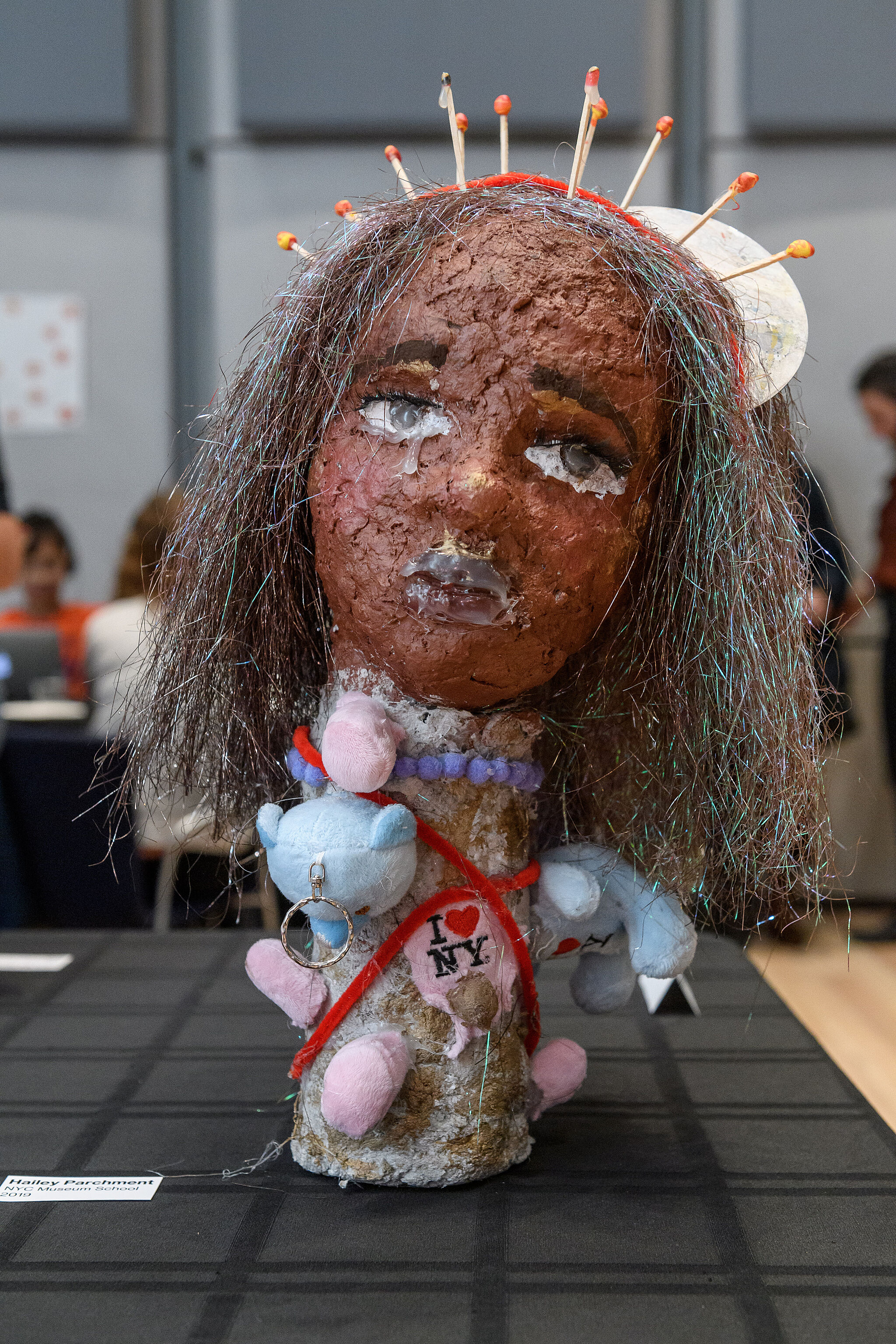YI Artist, Hailey, displays her mixed media sculpture, spring 2019