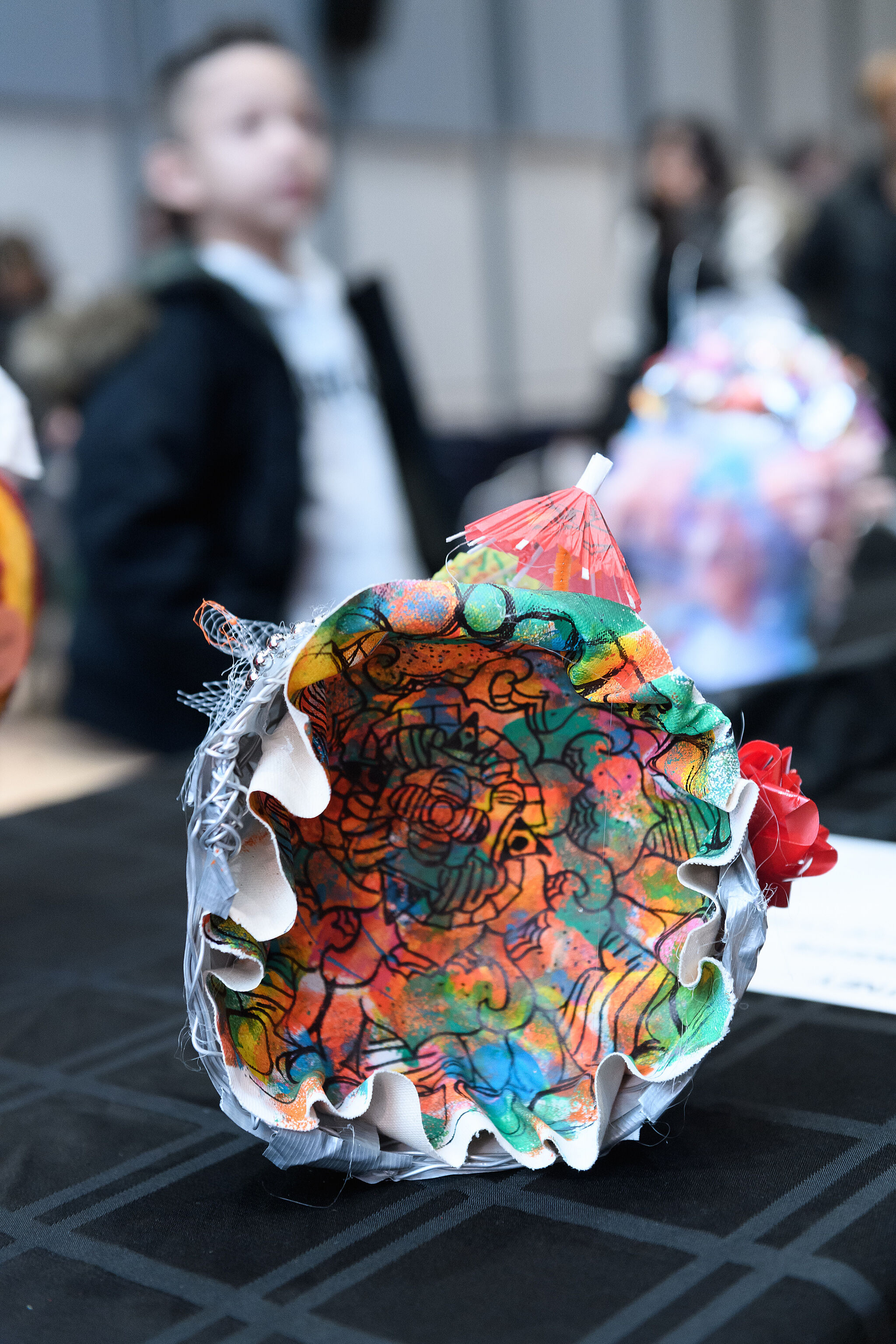A multicolor sculpture made out of found materials, made by a YI Artist, spring 2019.