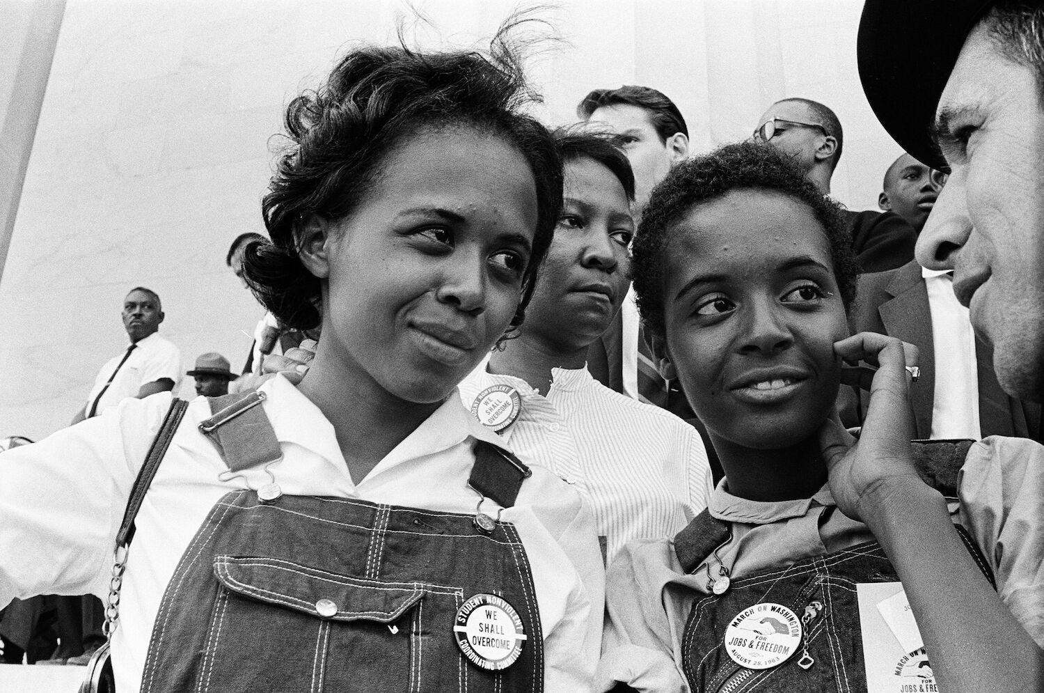 Two women standing next to each other at the 1963 March on Washington. 