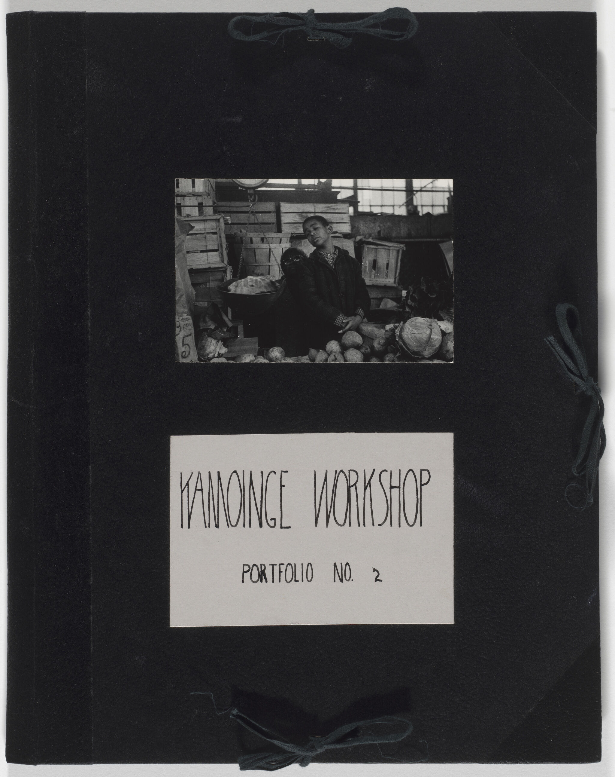 A portfolio cover that reads "Kamoinge Workshop Portfolio No. 2". 