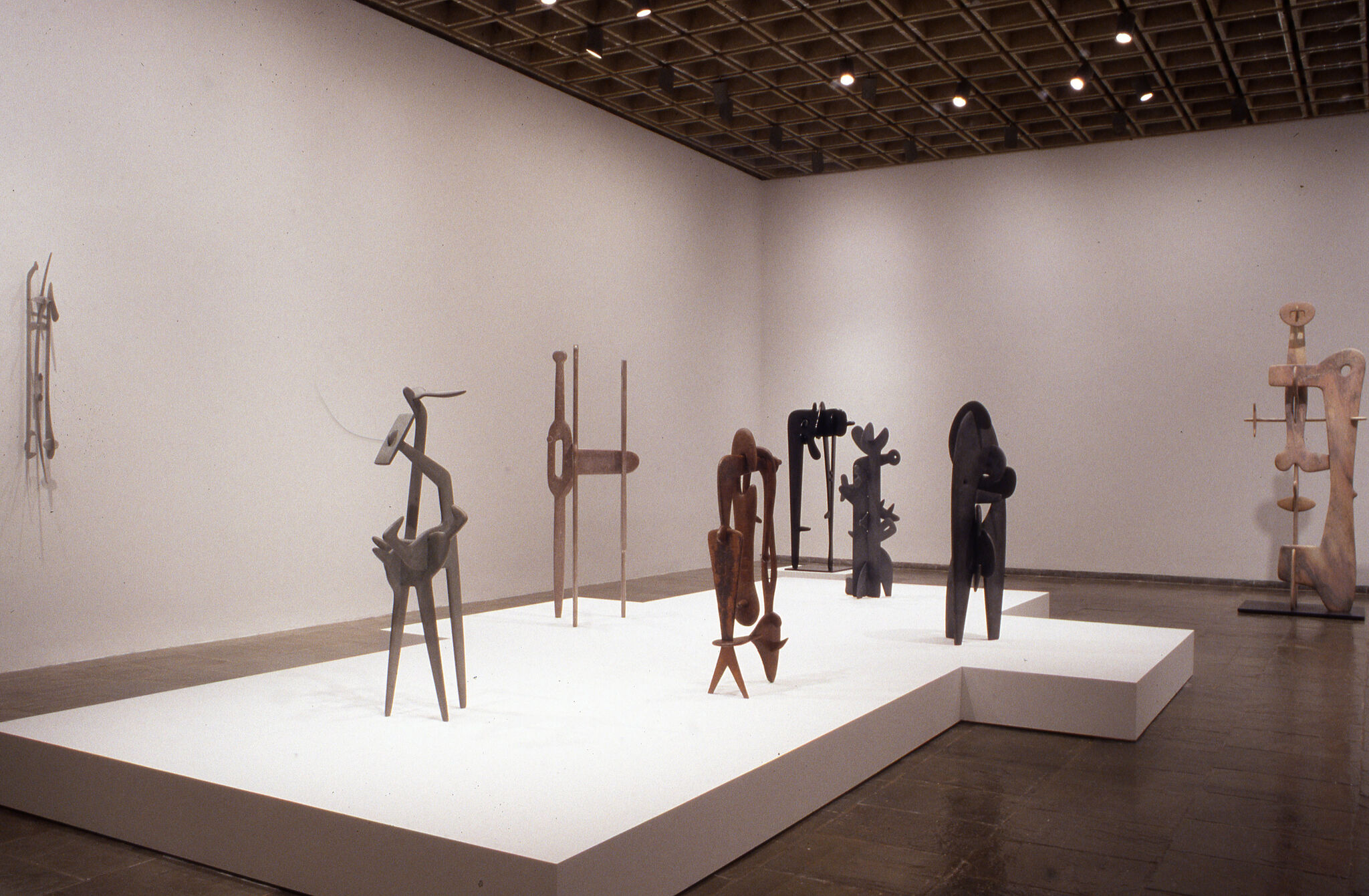 A gallery filled with sculptures.