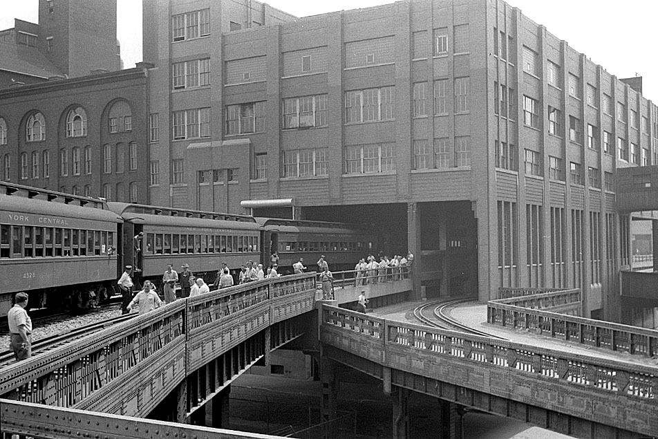 A train passes through the Chelsea Market Passage. 