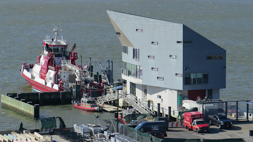 A boat stationed at the edge of Pier 53. 