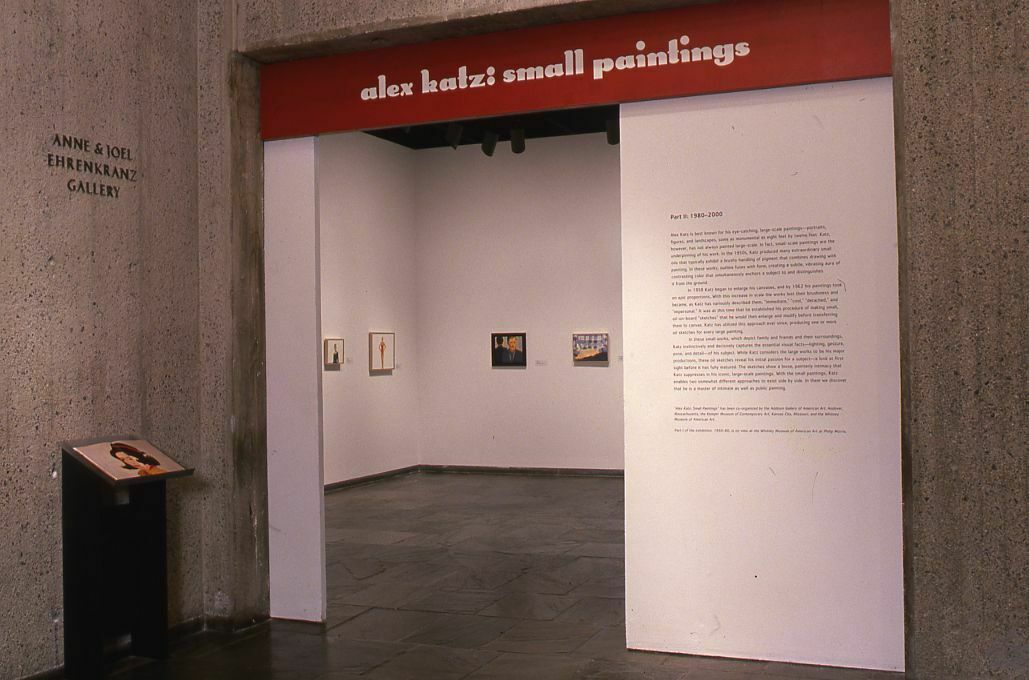 The entrance to the exhibition, along with a red sign with white text for Alex Katz: Small Paintings.