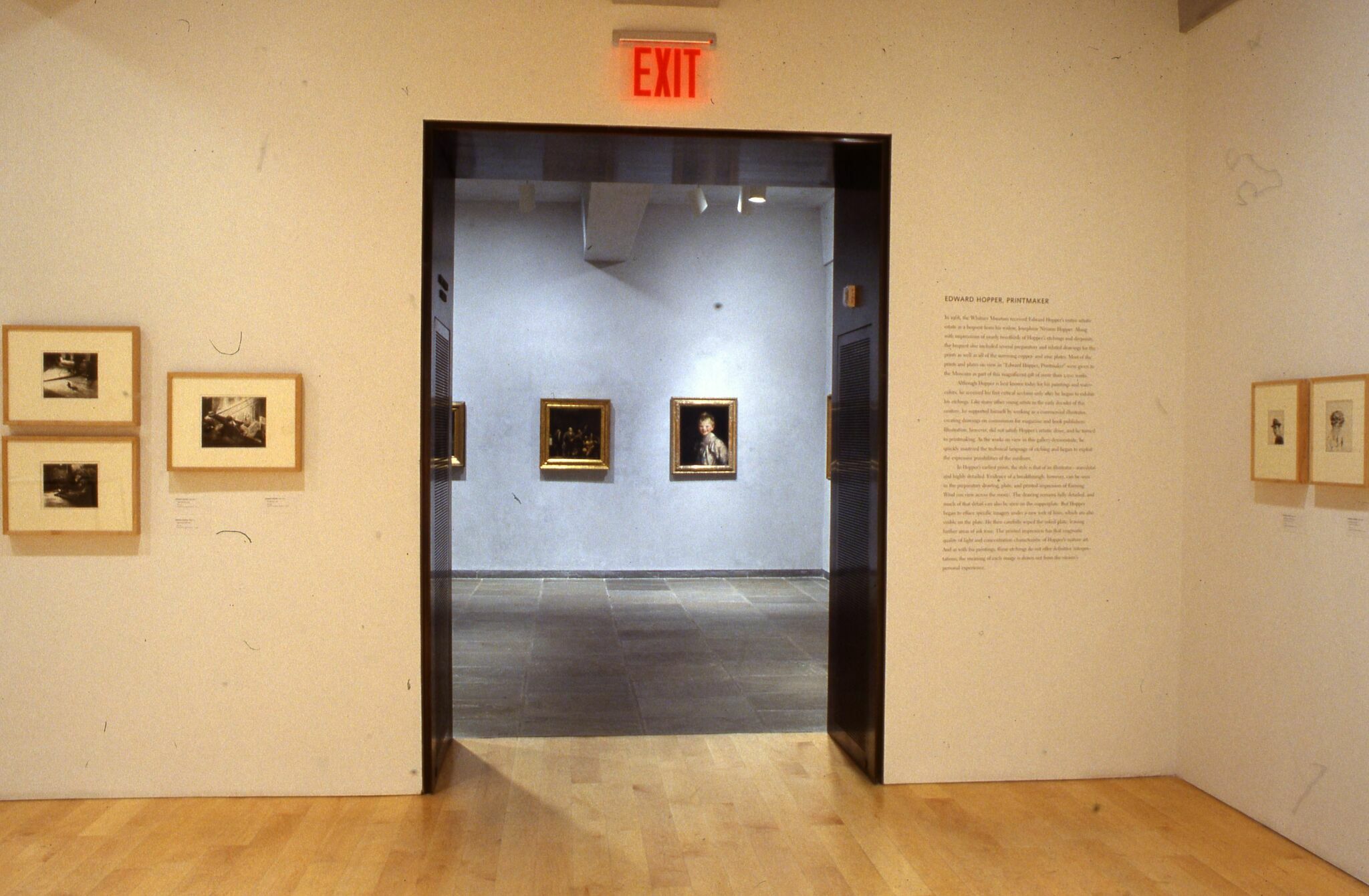A gallery with wall text for Edward Hopper, Printmaker, alongside framed prints by Edward Hopper.
