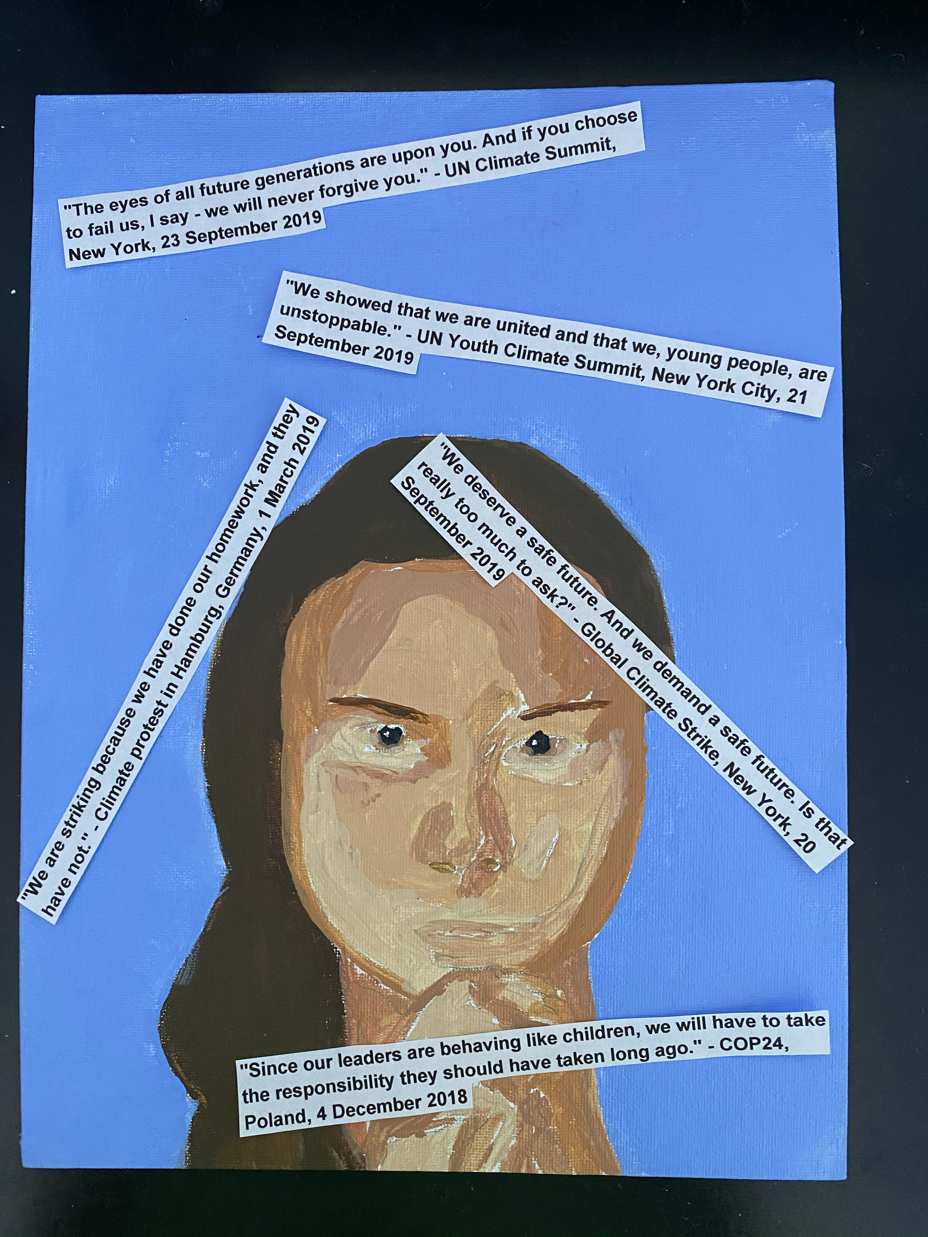 A portrait of Greta Thunberg against a blue background. 
