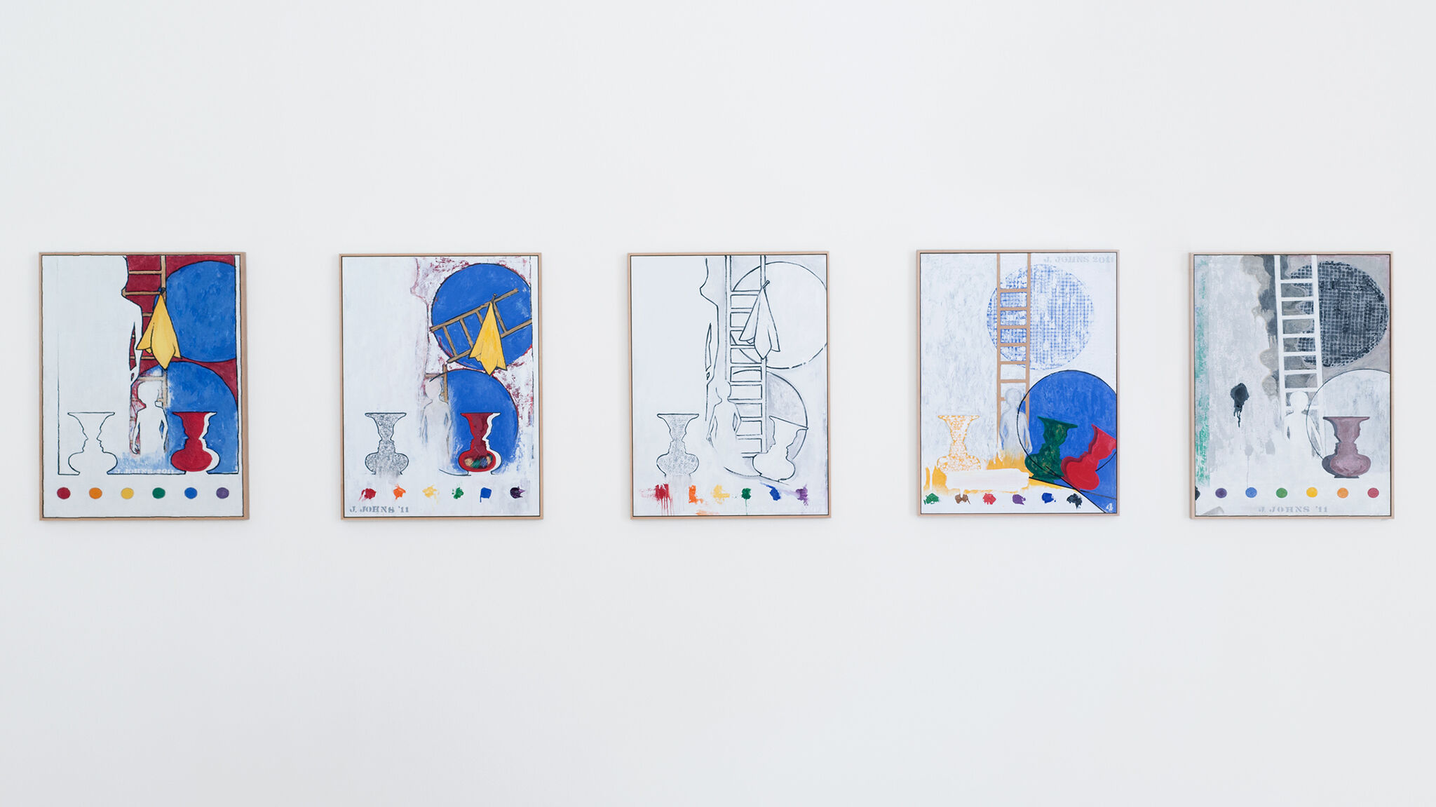 Five framed works by Jasper Johns are mounted side-by-side on a wall.